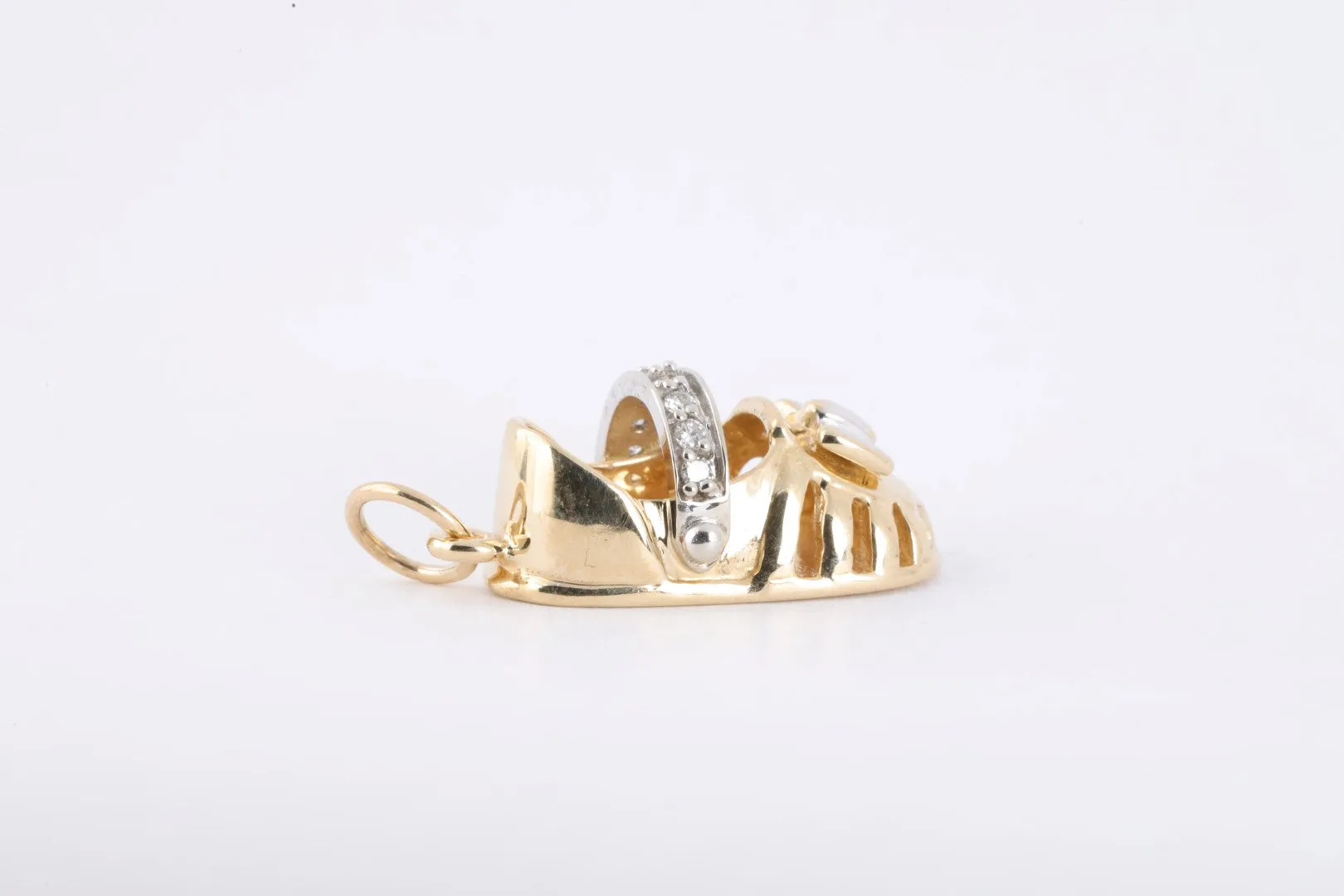 14k Yellow Gold 0.08tcw Diamond Baby Shoe Pendant (4.11g.)