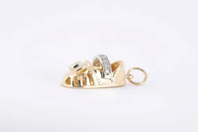 14k Yellow Gold 0.08tcw Diamond Baby Shoe Pendant (4.11g.)